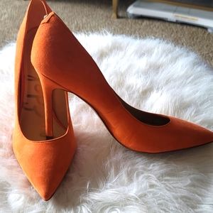 Orange pumps